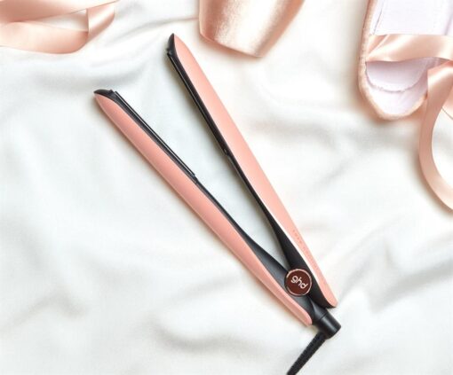 ghd Platinum+ hair straighteners in pink peach